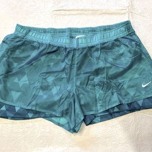 Nike Dri-Fit 2 in 1 running short with a small pocket for keys and such. NWT